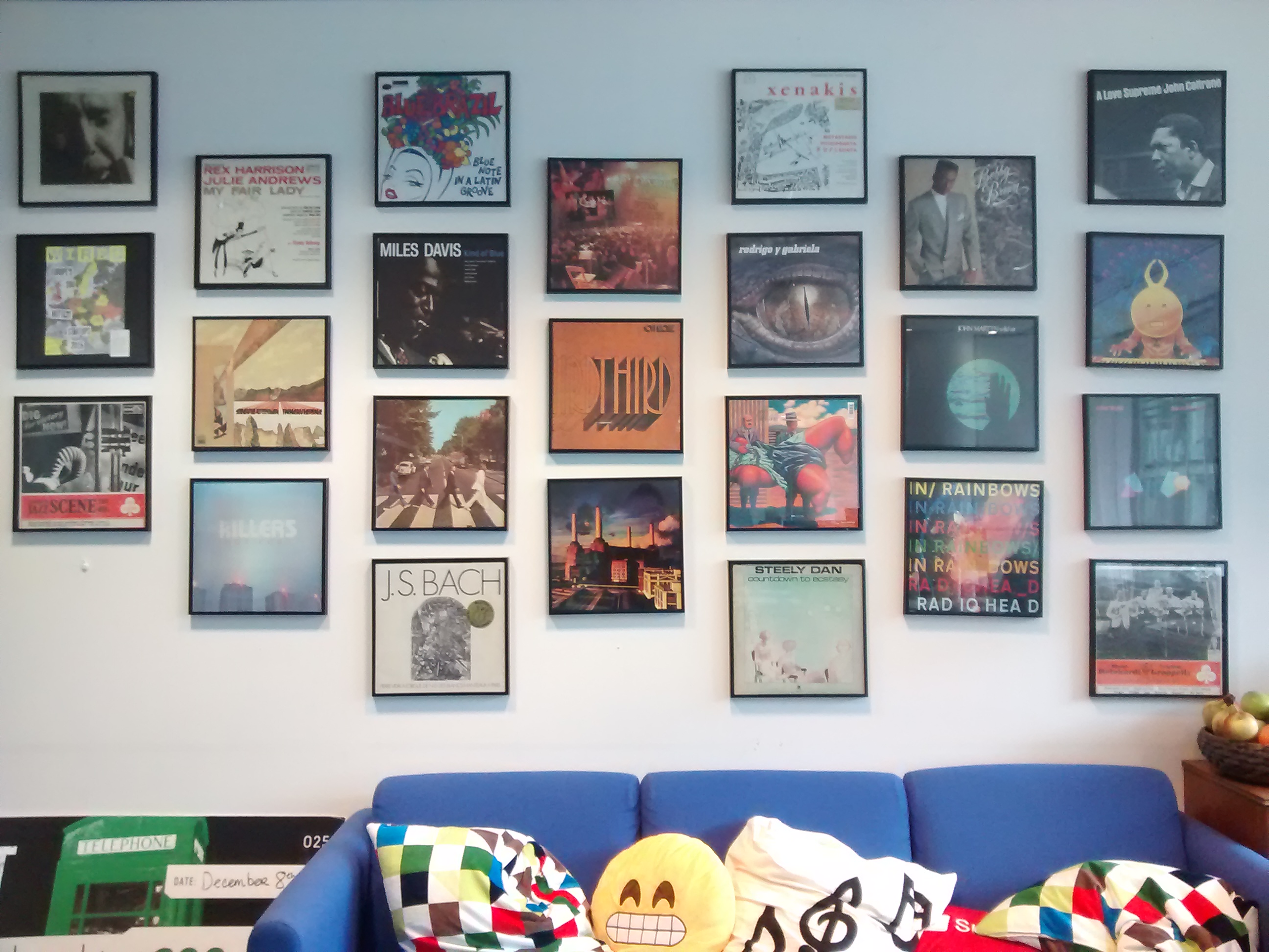 The Jukedeck wall — a vinyl record for every team member